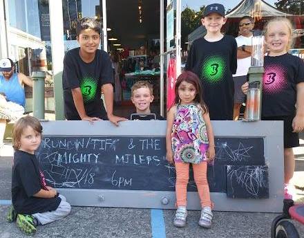 Mighty Milers with chalkboard